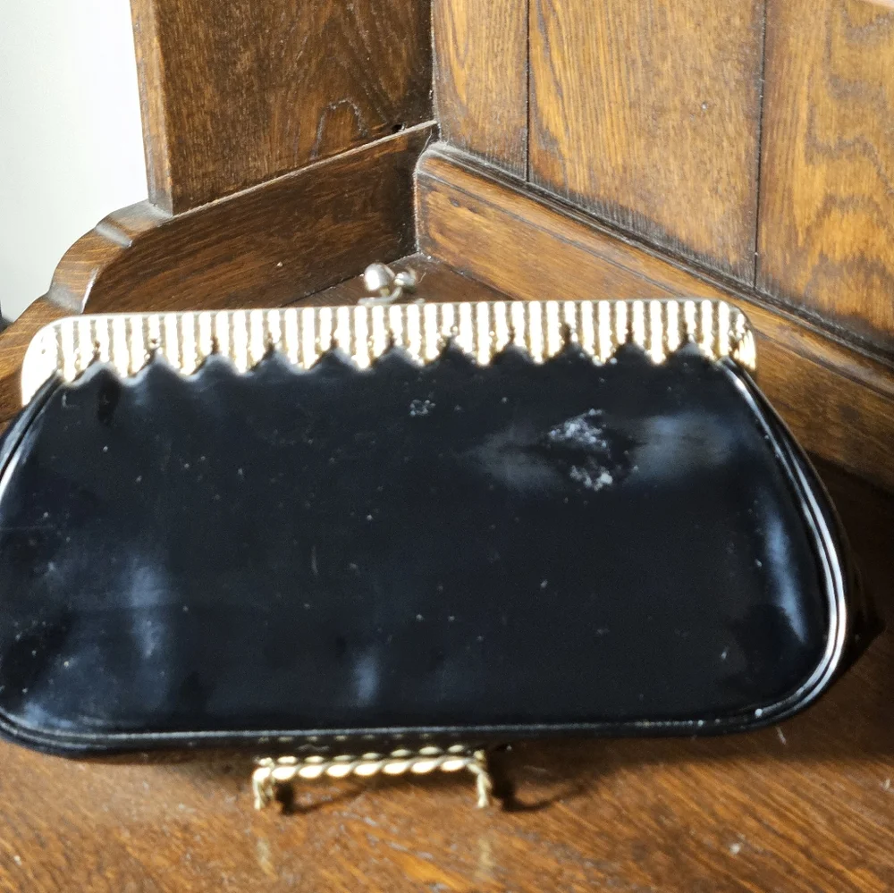 Elegant Black Clutch with Gold Accents